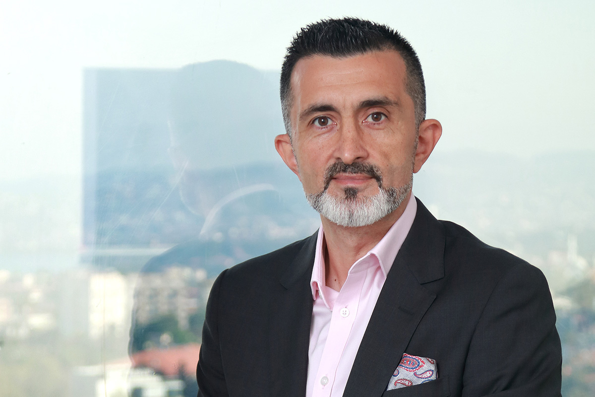 Headshot of Cenker Ozhelvaci