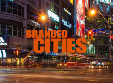 Outdoor advertising at Dundas Square Toronto with Branded Cities  logo in the centre of image