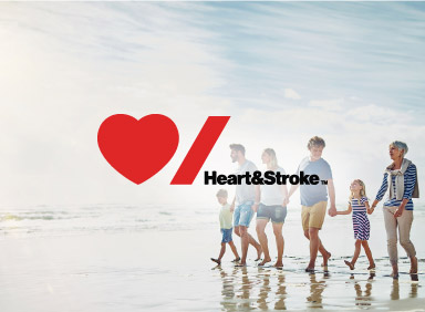 Family walking on a beach with Heart and Stroke Logo overlay in centre of image