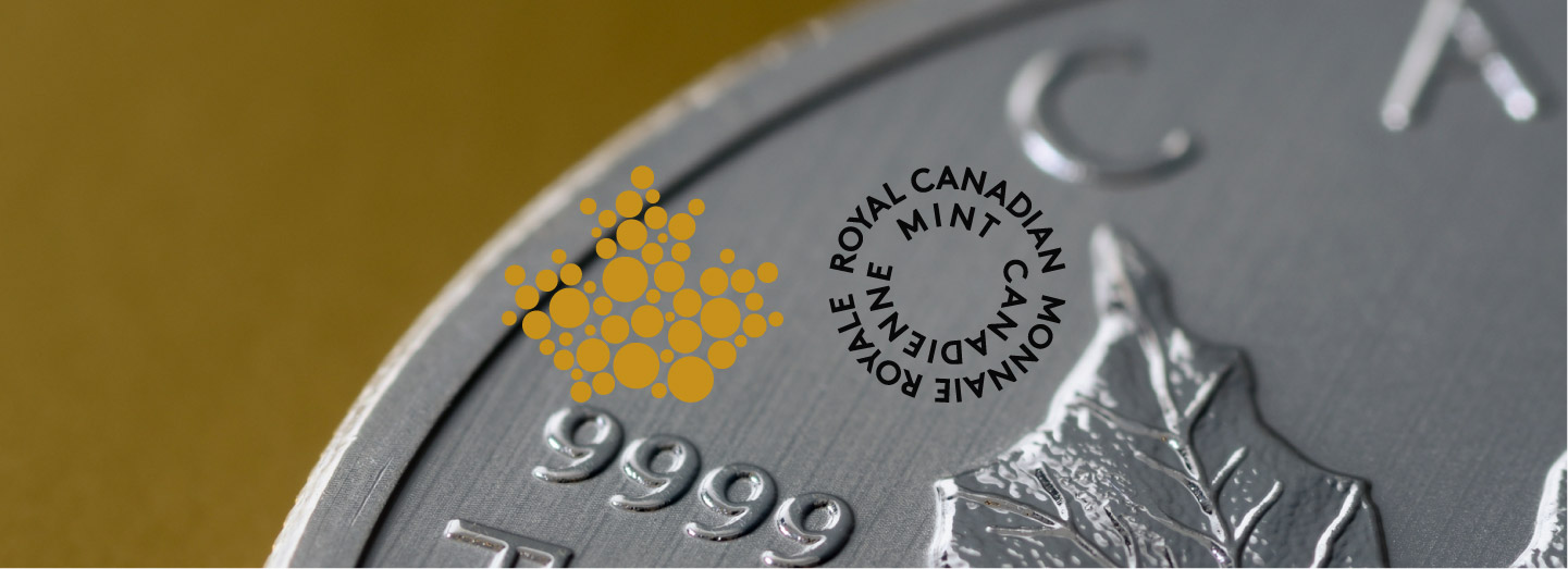 Close-up of a silver maple leaf coin with the Royal Canadian Mint logo, heading a case study
