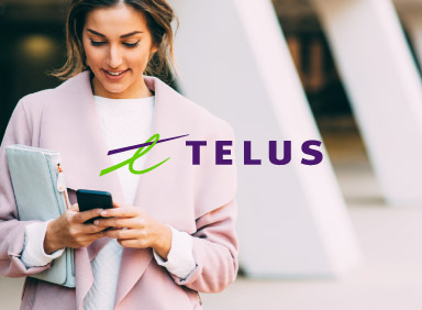 Professional woman texting on her smartphone with Telus logo in the centre of image