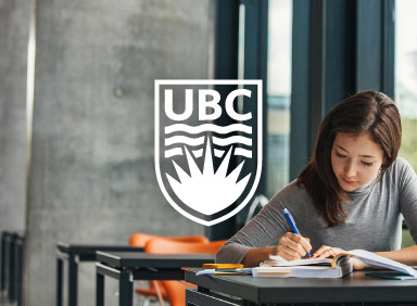 University student studying on campus bench with UBC logo floating in the middle of image