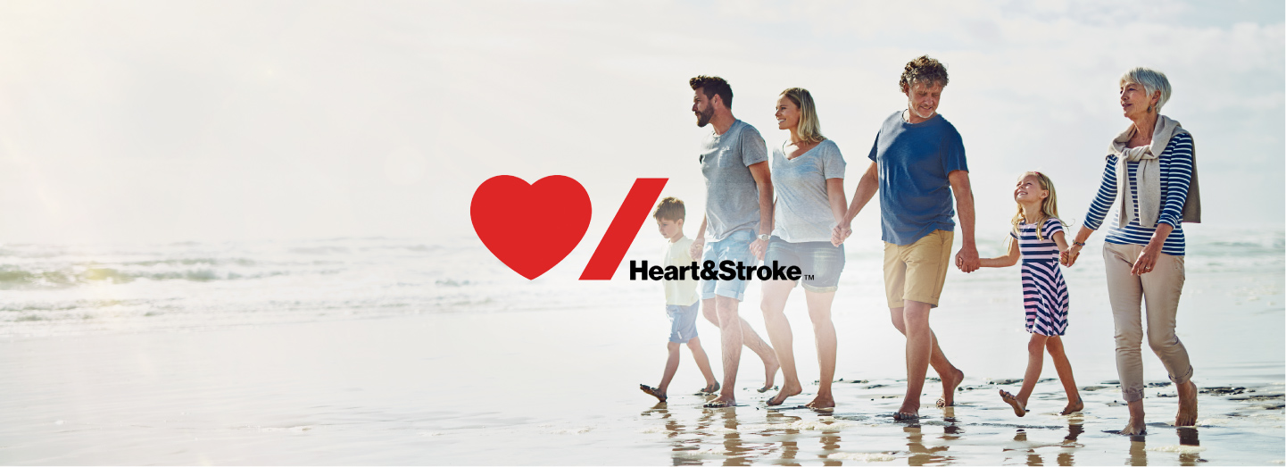 A family walking on a beach with Heart and Stroke Logo overlay