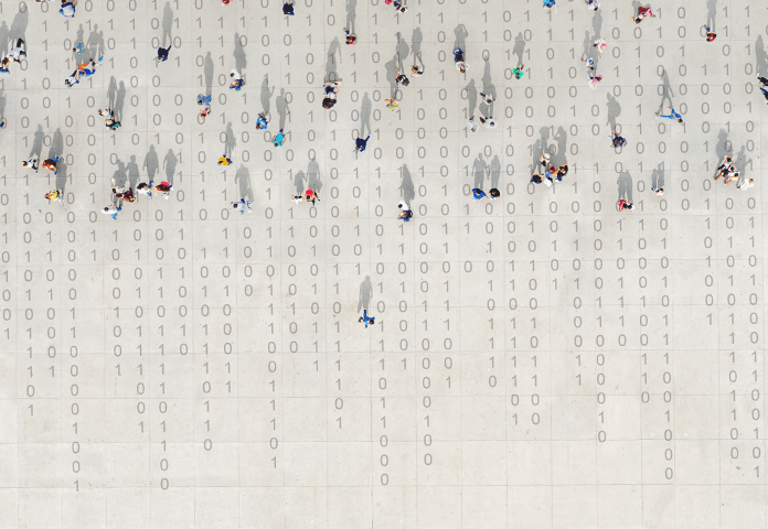 Aerial view of people walking over a surface covered in numbers, illustrating mobile movement data