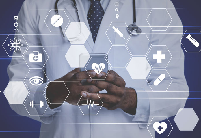 Health care professional in a white coat holding a phone surrounded by floating digital health icons