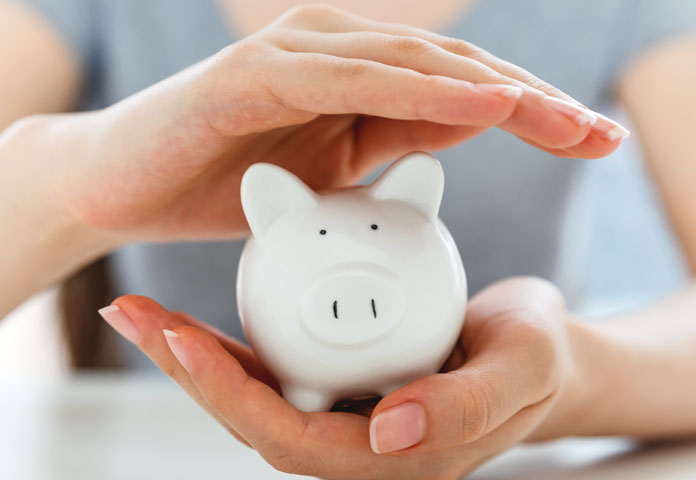 hands-sheltering-piggybank