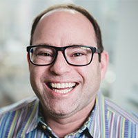 Headshot of Reuben Segelbaum